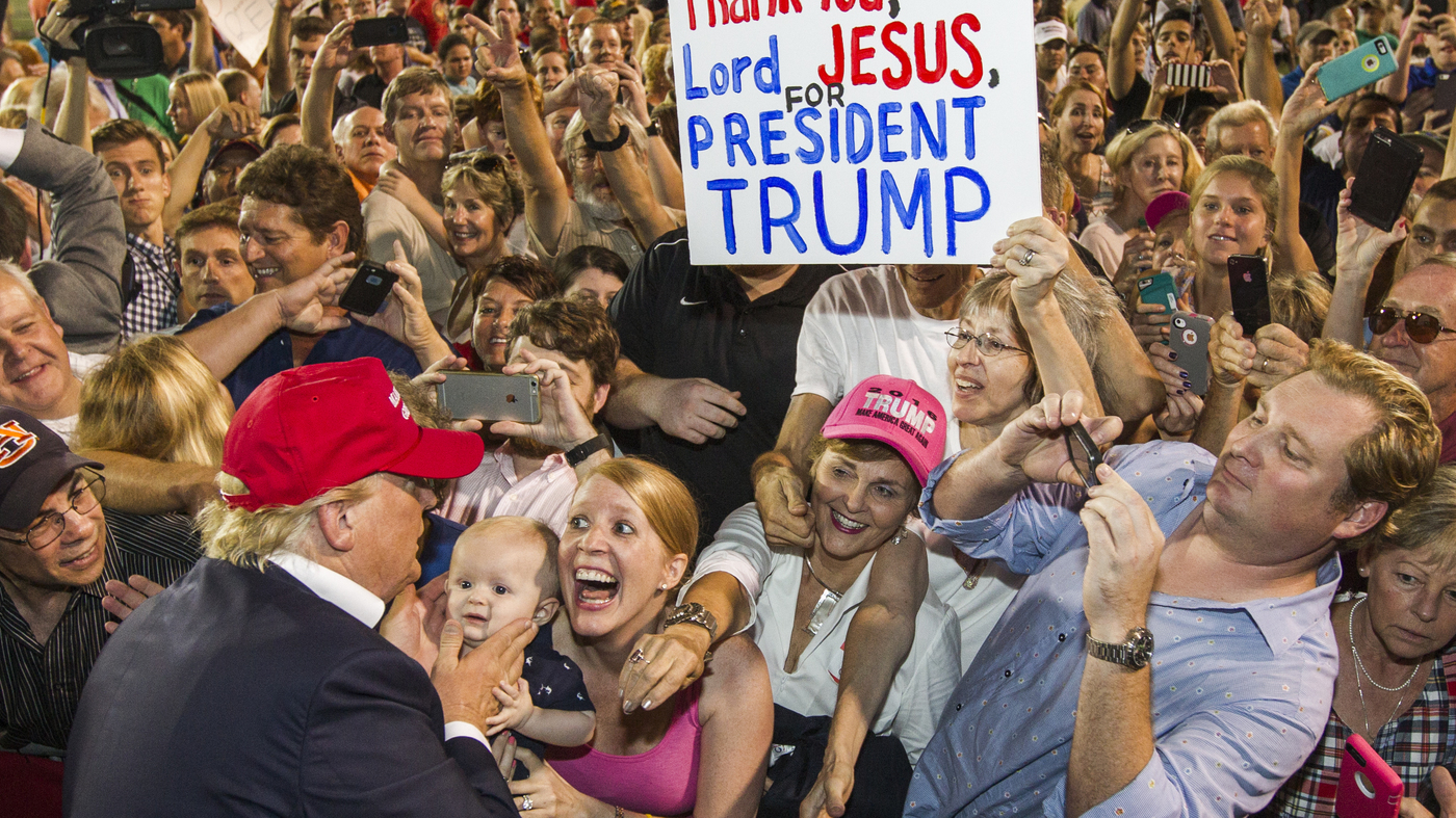 Enthusiastic supporters greet Donald Trump at a rally of more than 30,000 in Mobile, Ala., in August.